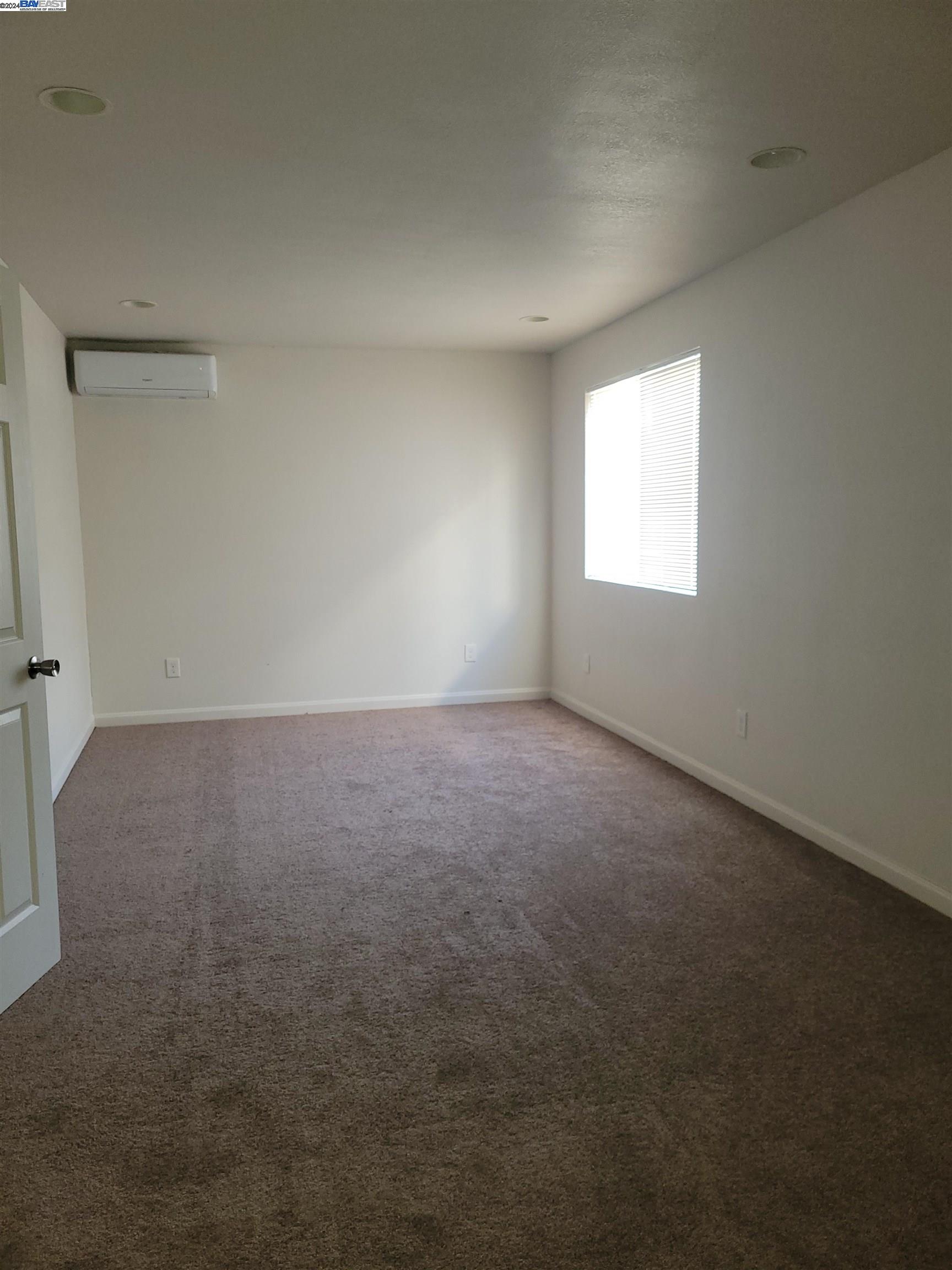 Toler Heights Oakland, CA 94605 - Photo 16 of 18 an empty room with a window