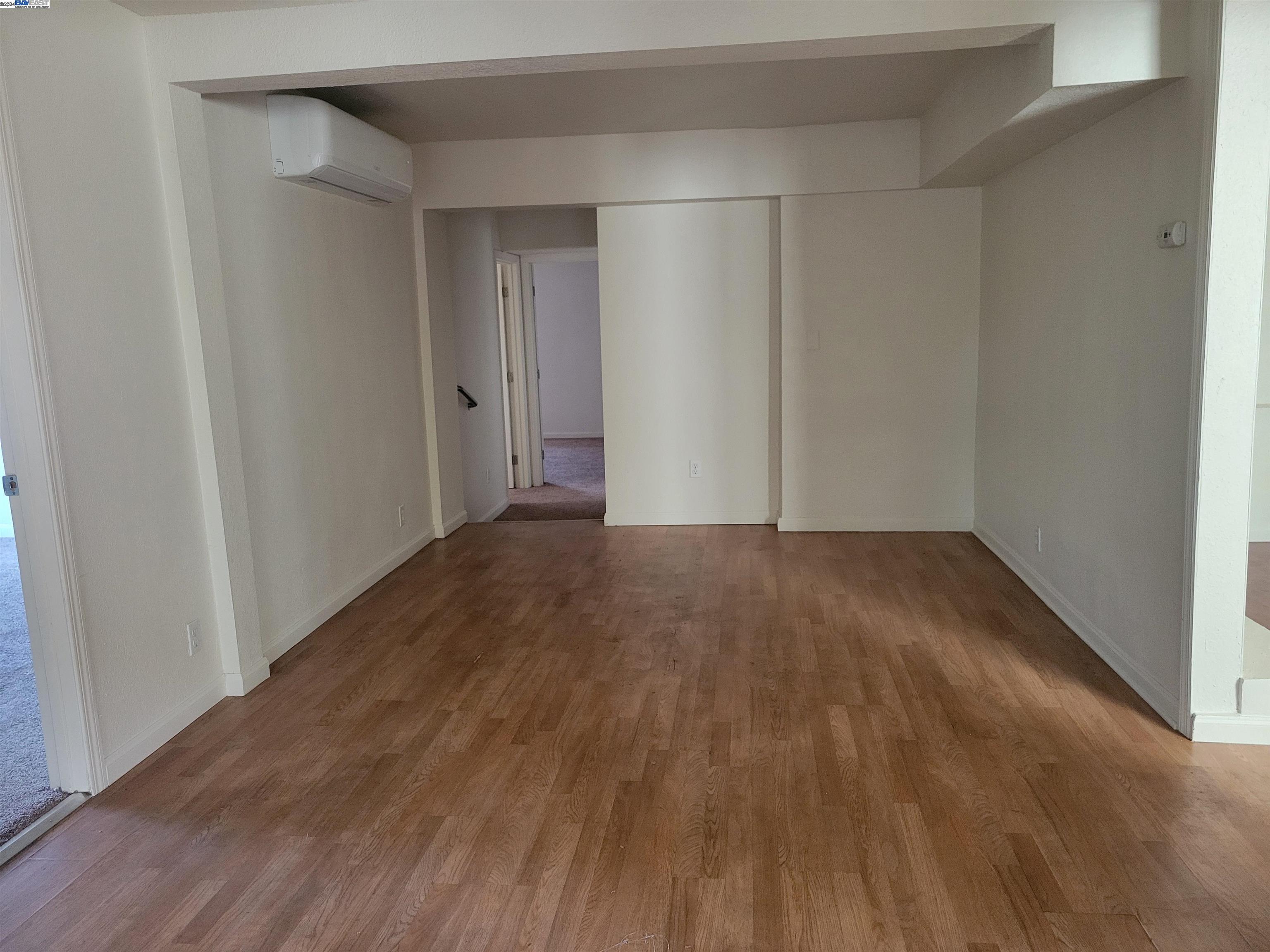 Toler Heights Oakland, CA 94605 - Photo 5 of 18 a view of an empty room with wooden floor