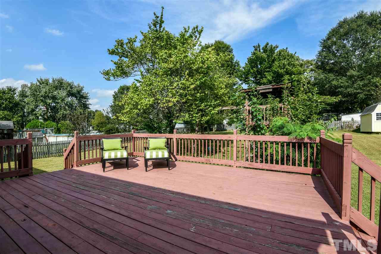 1017 Fairlong Road Wake Forest, NC 27587 - Photo 15 of 17 Large deck for entertaining or simply relaxing! Playset can be removed if not interested.