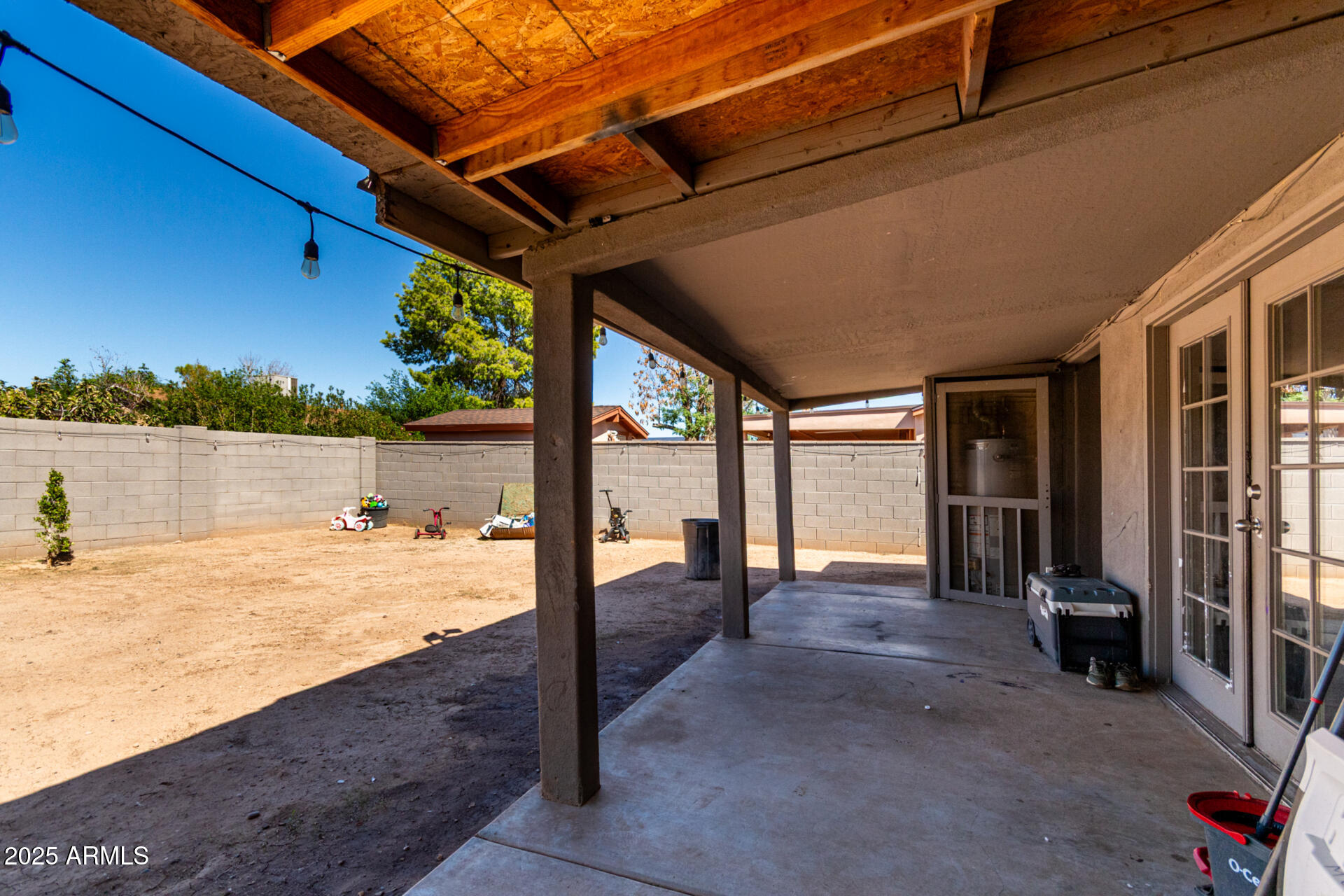 6224 West Berkeley Road Phoenix, AZ 85035 - Photo 22 of 27 a view of a room with wooden floor and a tub