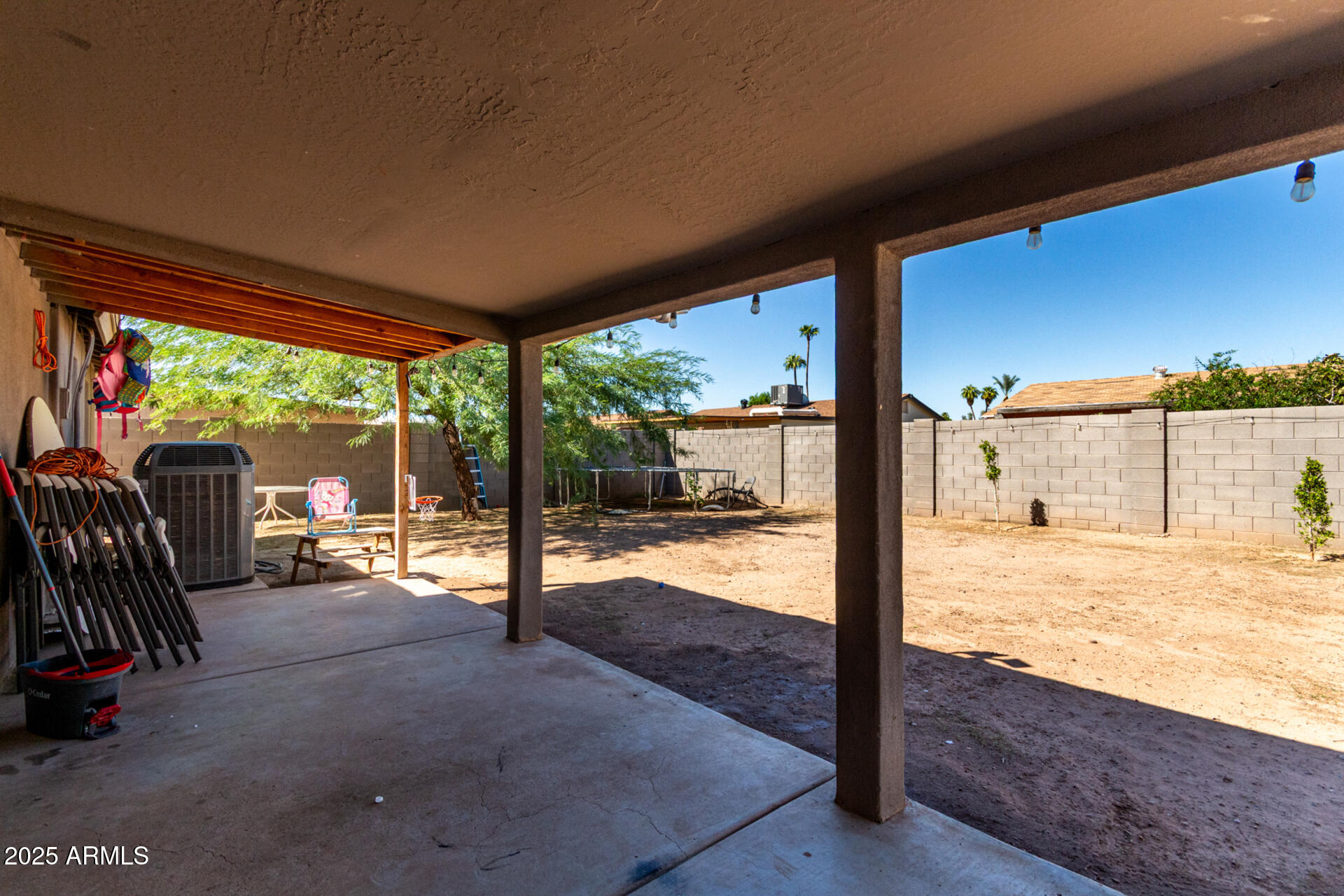 6224 West Berkeley Road Phoenix, AZ 85035 - Photo 23 of 27 a view of a living room and floor to ceiling window