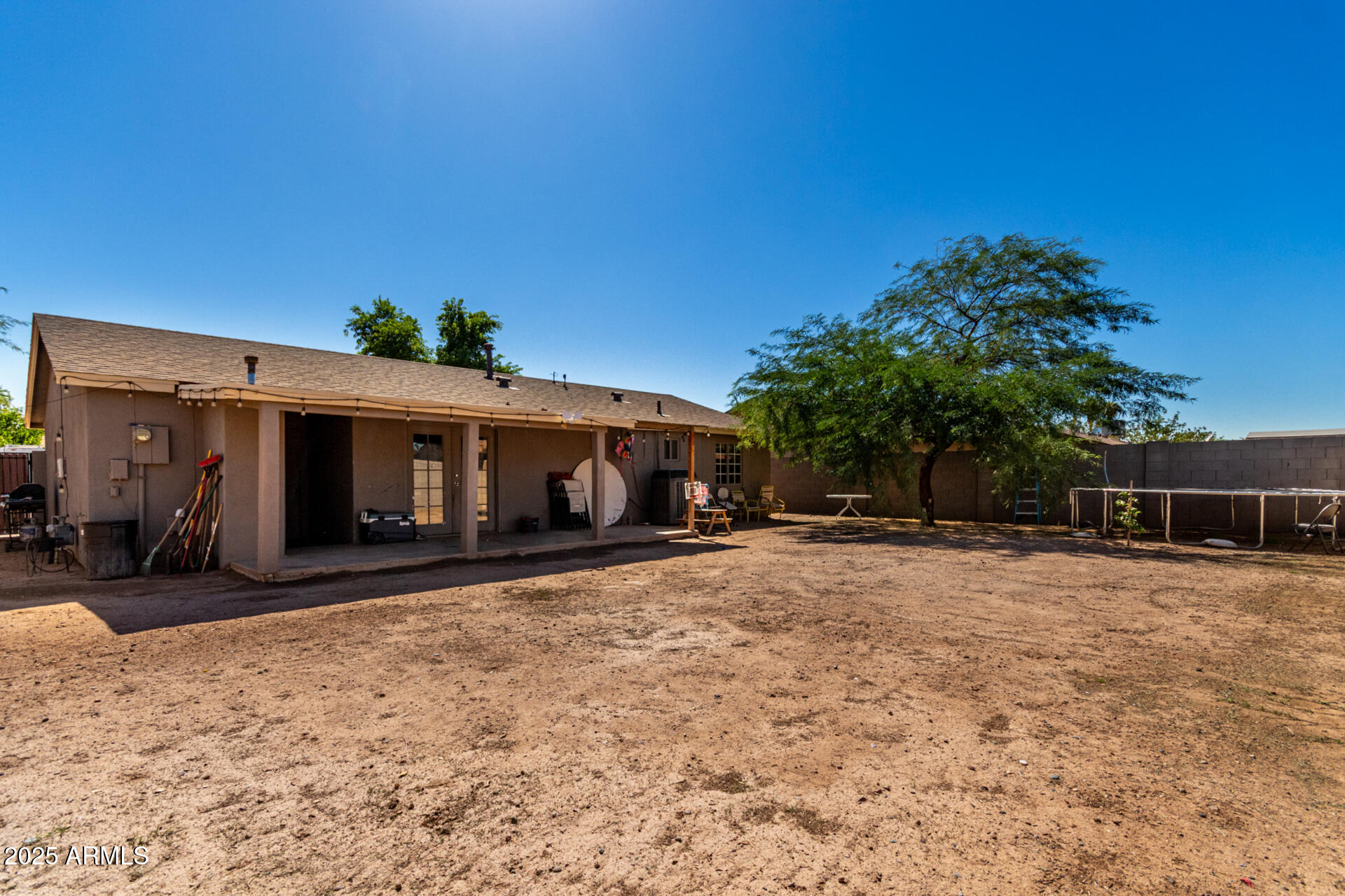 6224 West Berkeley Road Phoenix, AZ 85035 - Photo 25 of 27 a front view of a house with a yard