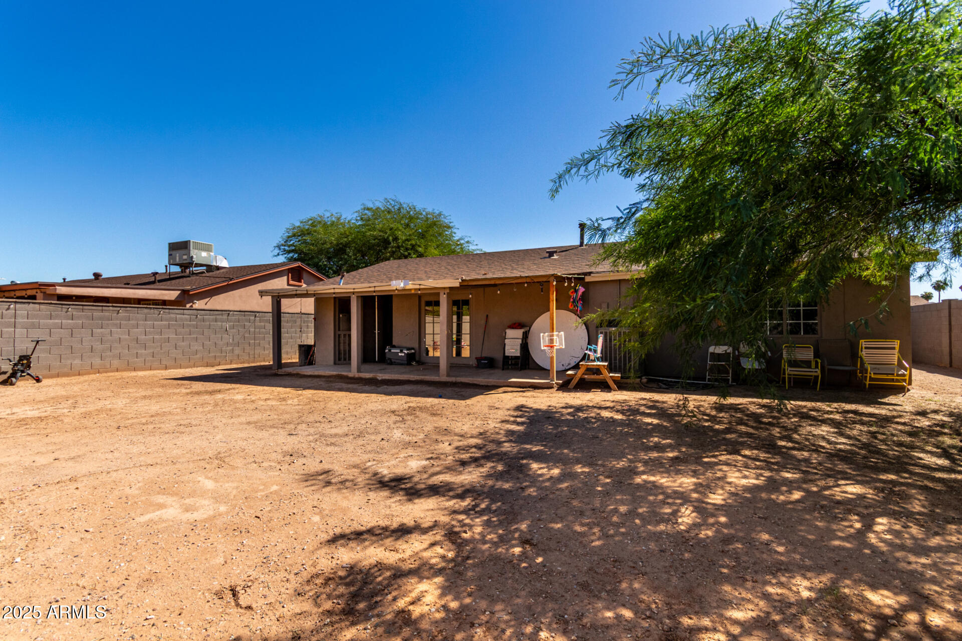 6224 West Berkeley Road Phoenix, AZ 85035 - Photo 26 of 27 a front view of a house with a yard
