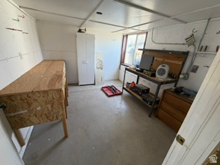 588 North 4500 West West Point, UT 84015 - Photo 48 of 61 Versatile utility space featuring concrete flooring, a window providing natural light, and ample wall space