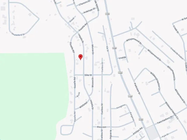 a car parked in the side of the street