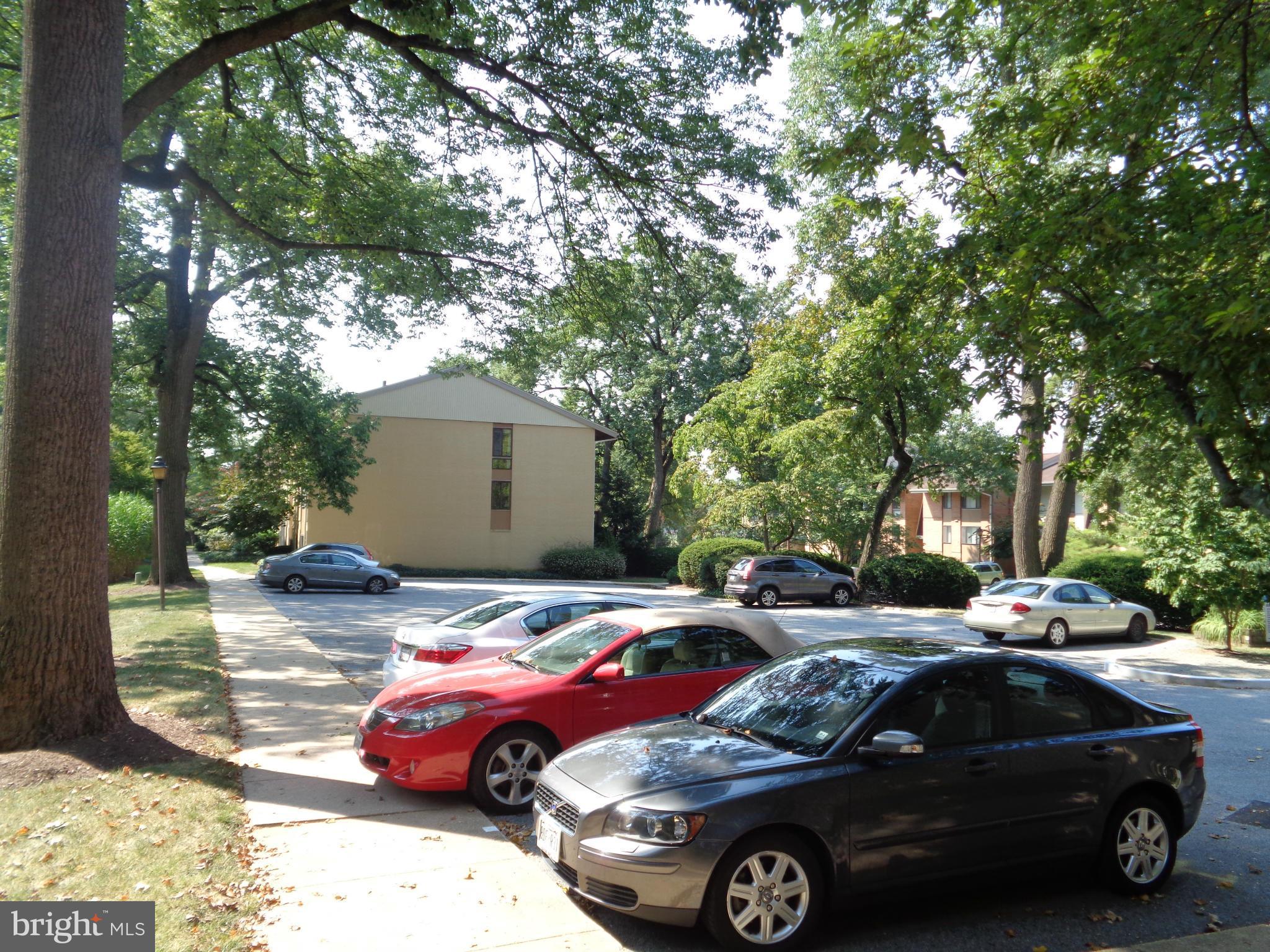 7 Cross Keys Road, Unit 7F Baltimore, MD 21210 - Photo 26 of 27 a view of a cars parked in a parking lot