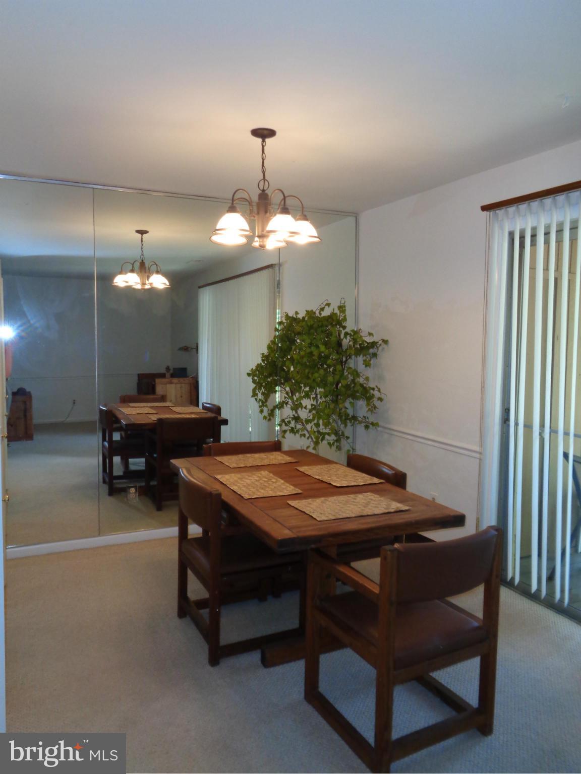 7 Cross Keys Road, Unit 7F Baltimore, MD 21210 - Photo 7 of 27 a room with furniture pool table and wooden floor