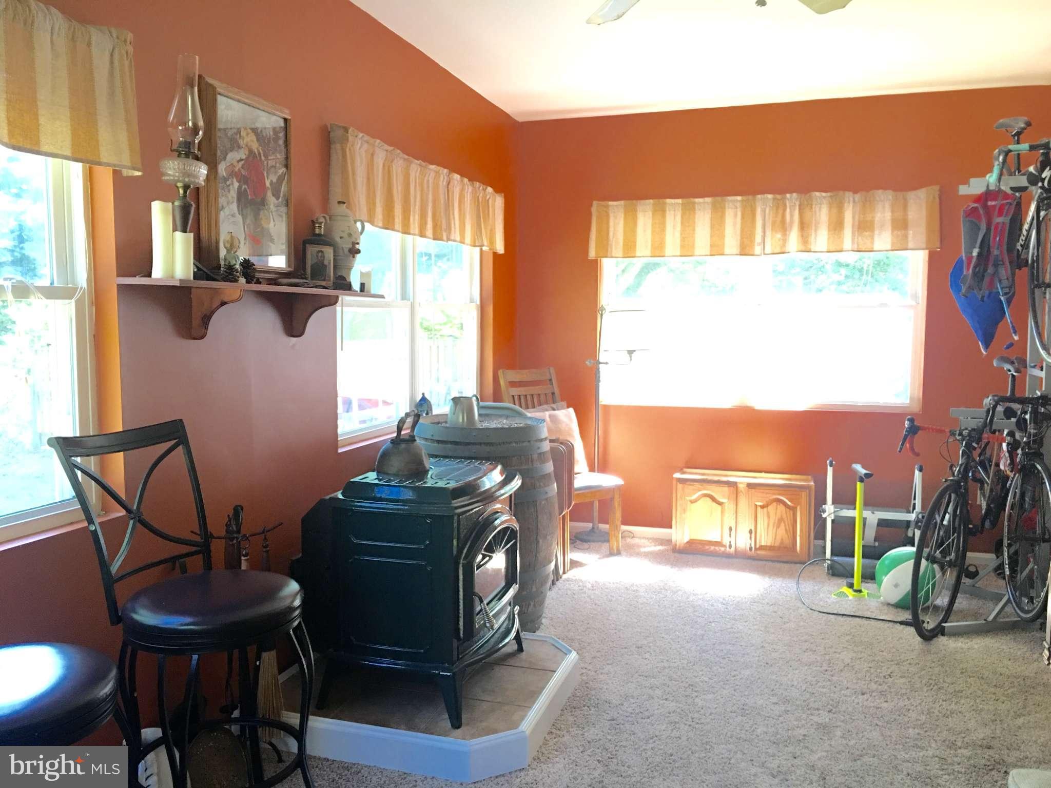 44099 Sandy Bottom Road Hollywood, MD 20636 - Photo 15 of 30 a view of a livingroom with furniture and a window