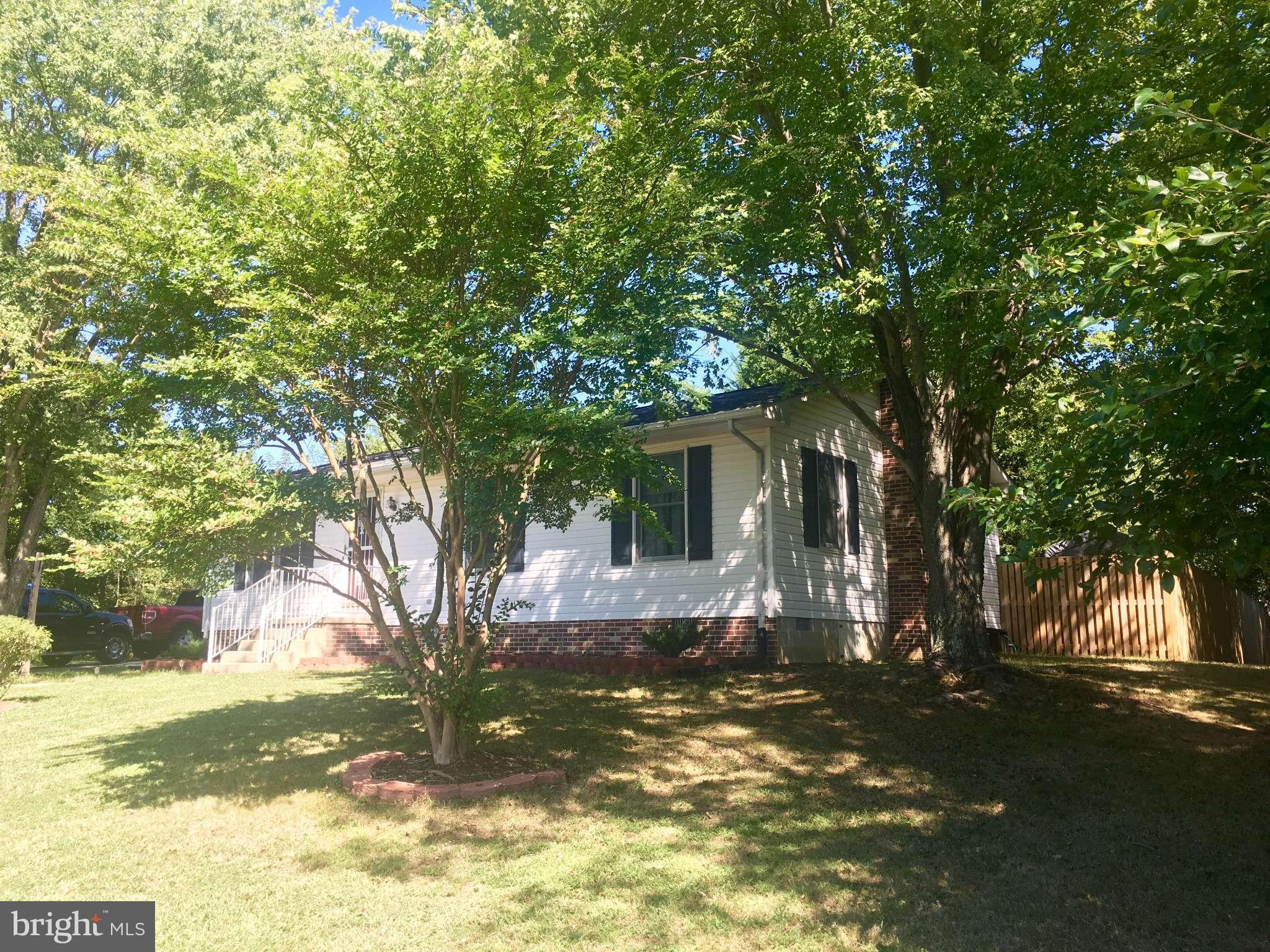 44099 Sandy Bottom Road Hollywood, MD 20636 - Photo 19 of 30 a view of a house with a yard