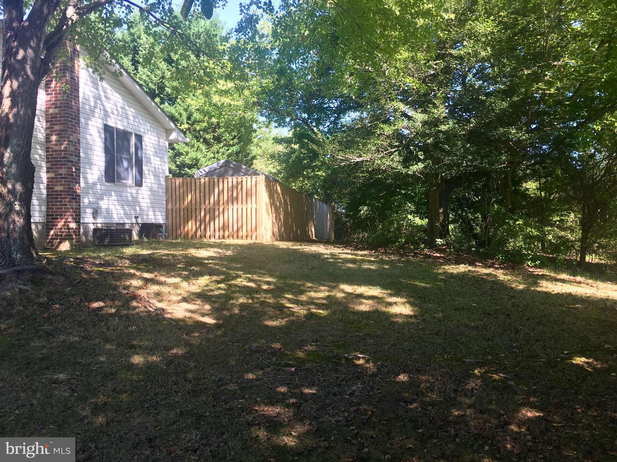 44099 Sandy Bottom Road Hollywood, MD 20636 - Photo 20 of 30 a view of a house with a yard