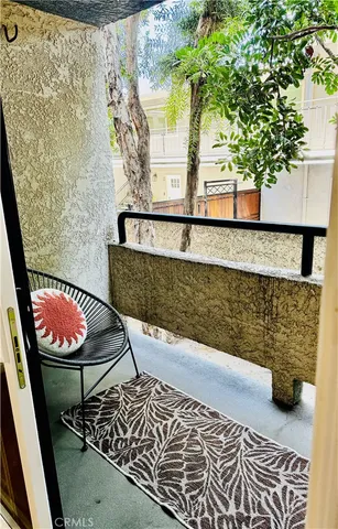 a view of swimming pool with seating space