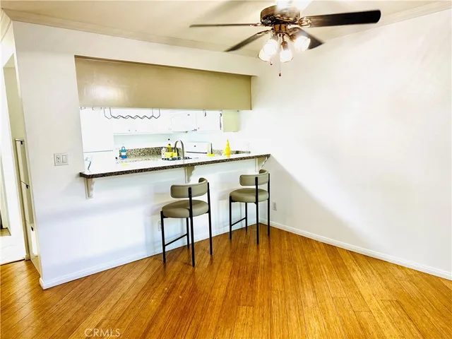 a room with a table and chairs