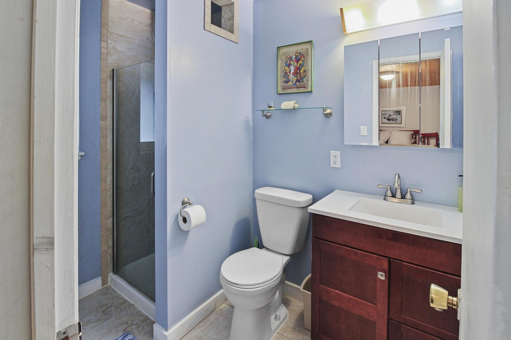 1503 Alpine Meadows Road Alpine Meadows, CA 96146 - Photo 11 of 28 a bathroom with a toilet a sink and mirror