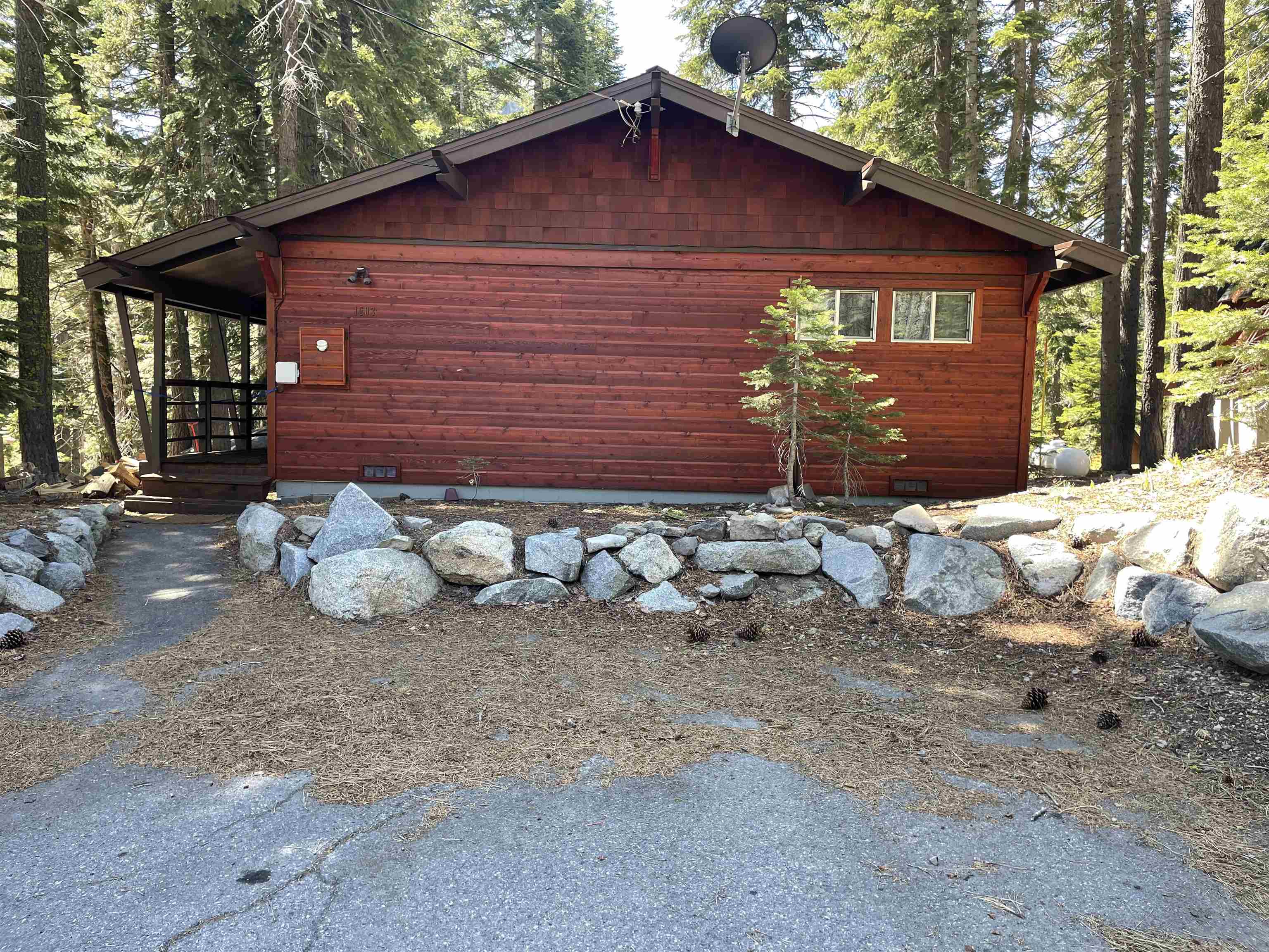1503 Alpine Meadows Road Alpine Meadows, CA 96146 - Photo 15 of 28 a view of a small house with yard