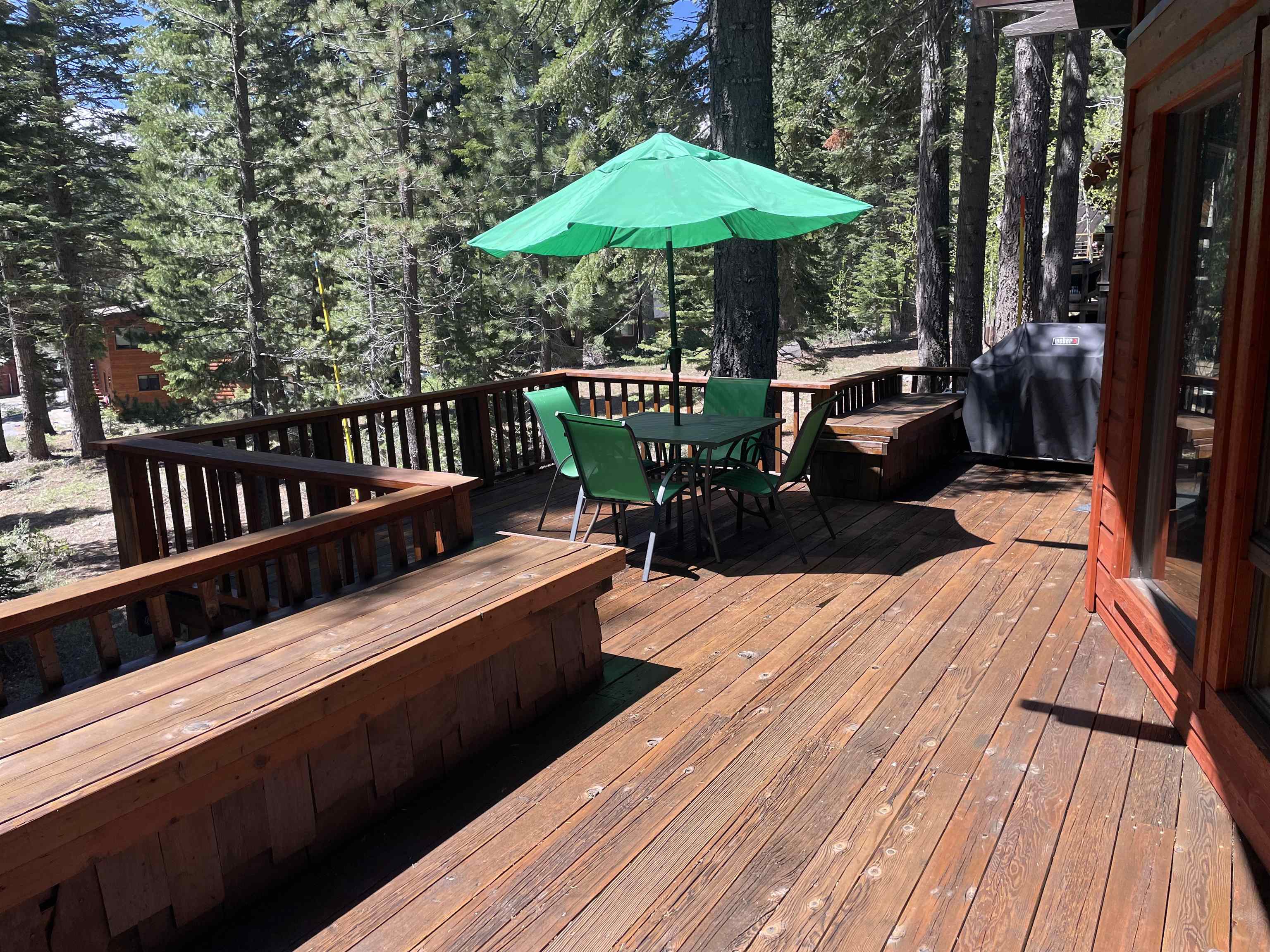 1503 Alpine Meadows Road Alpine Meadows, CA 96146 - Photo 18 of 28 a view of a wooden deck with furniture