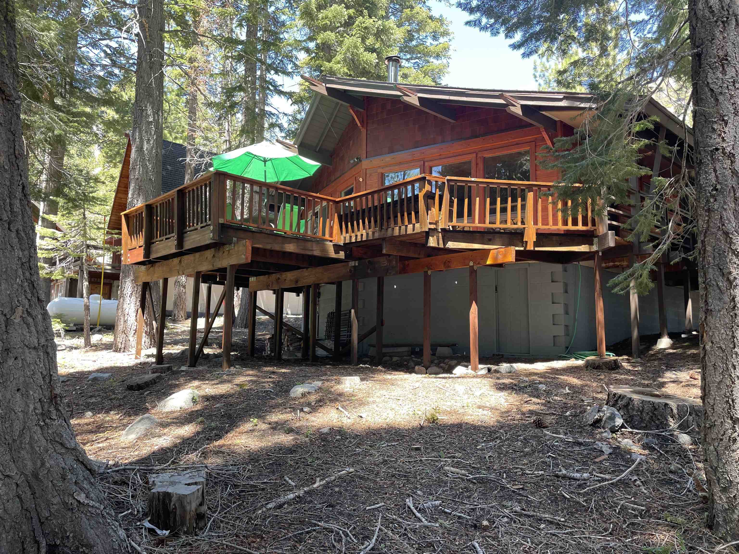 1503 Alpine Meadows Road Alpine Meadows, CA 96146 - Photo 19 of 28 a front view of a house with a yard