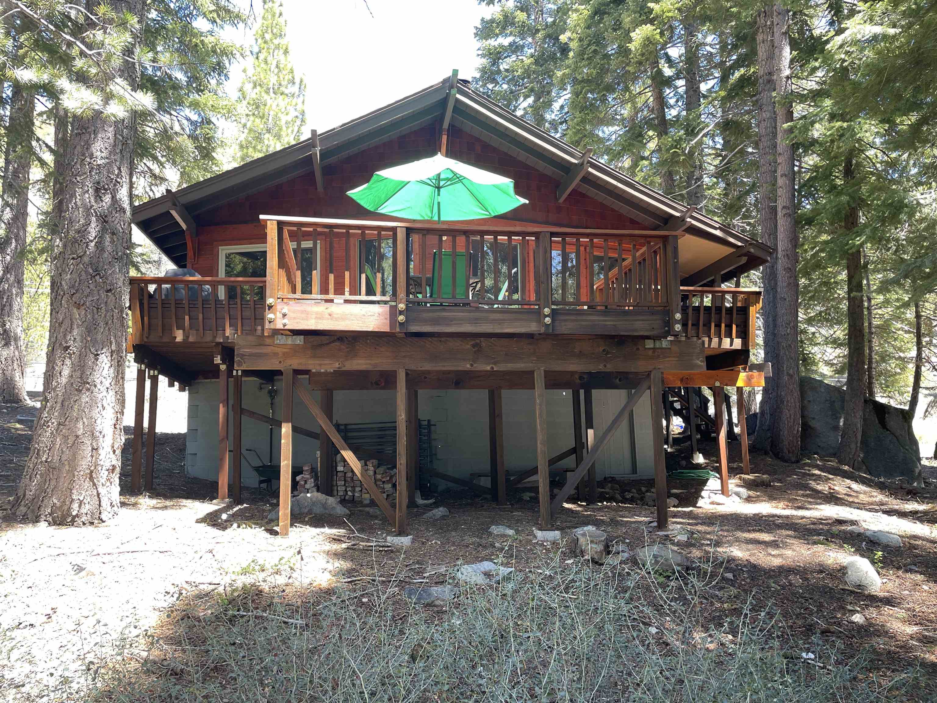 1503 Alpine Meadows Road Alpine Meadows, CA 96146 - Photo 20 of 28 a front view of a house with a yard