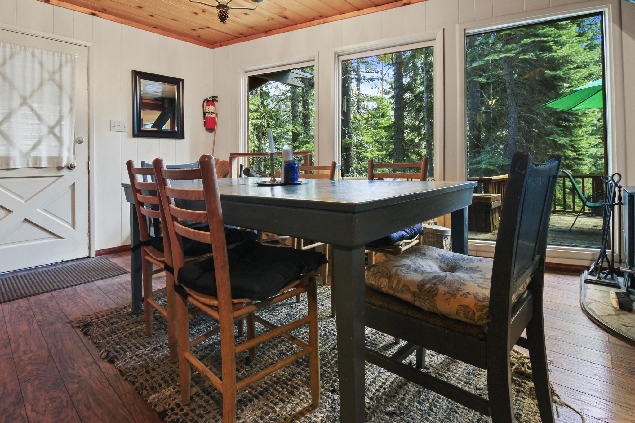 1503 Alpine Meadows Road Alpine Meadows, CA 96146 - Photo 2 of 28 a view of a dining room with furniture window and wooden floor