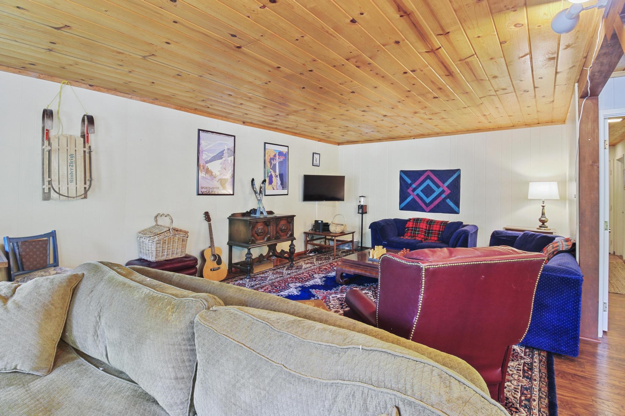 1503 Alpine Meadows Road Alpine Meadows, CA 96146 - Photo 5 of 28 a living room with furniture and a flat screen tv