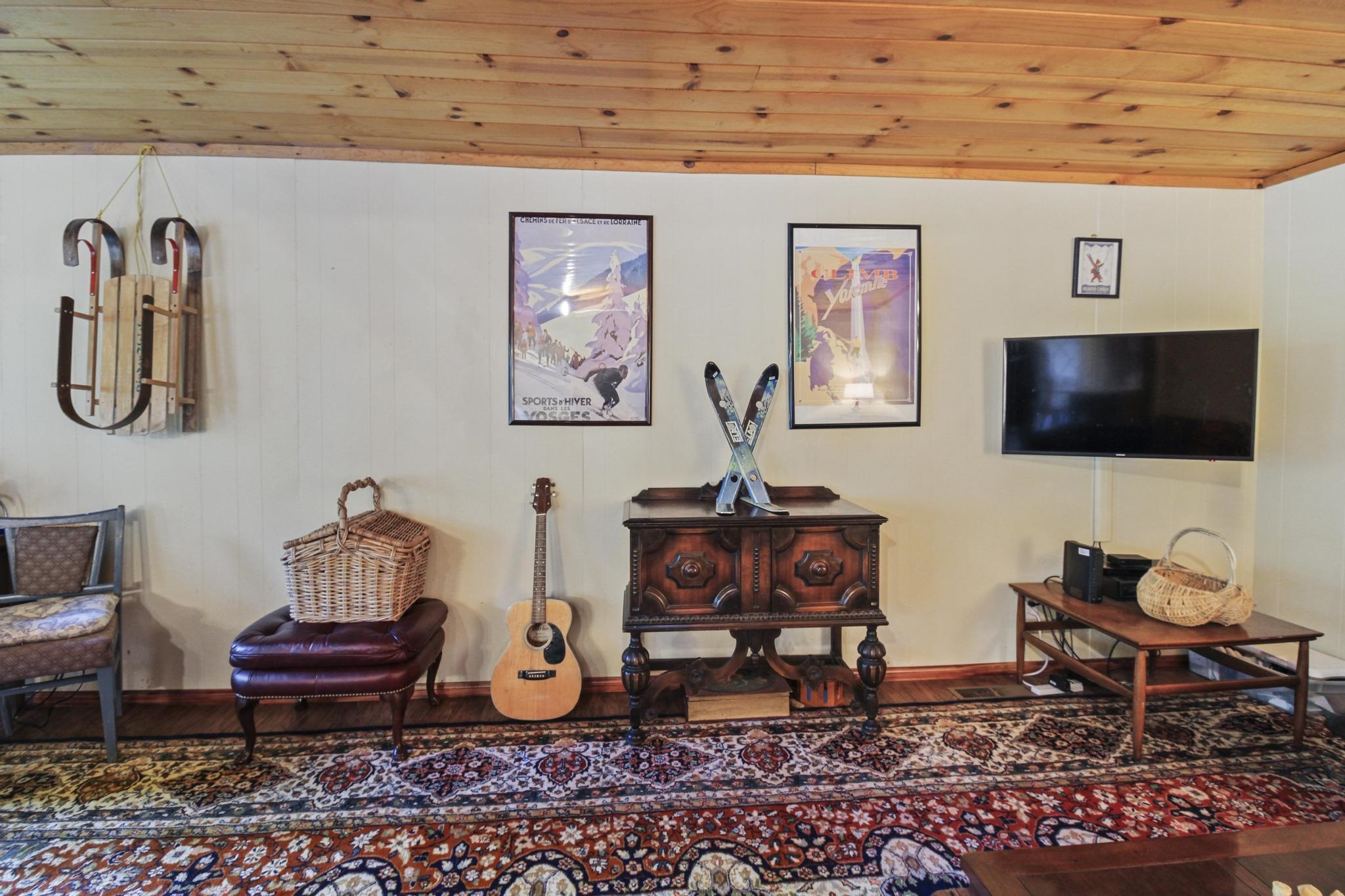 1503 Alpine Meadows Road Alpine Meadows, CA 96146 - Photo 7 of 28 a living room with furniture and a flat screen tv