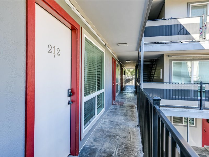 3110 Red River Street, Unit D212 Austin, TX 78705 - Photo 16 of 20 a view of a hallway with furniture