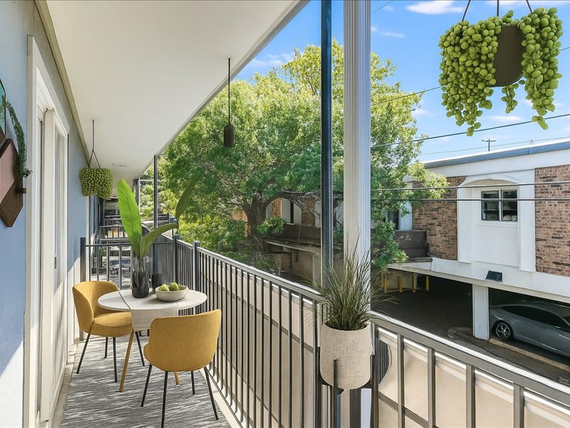 3110 Red River Street, Unit D212 Austin, TX 78705 - Photo 10 of 20 a view of a chair and tables in the balcony