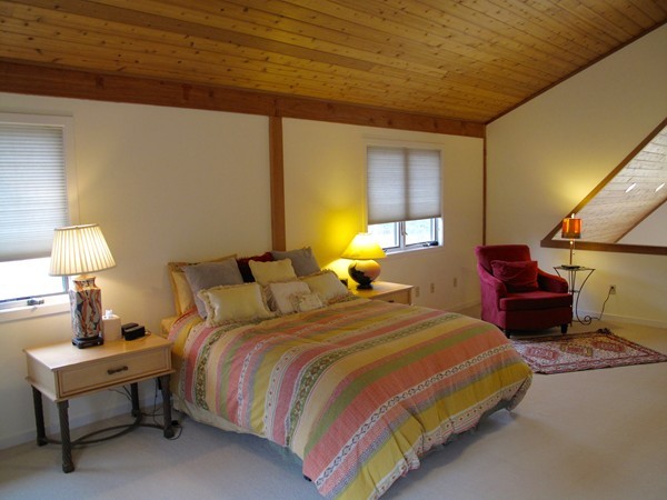 195 Kennedy Road Northampton, MA 01053 - Photo 21 of 22 a bedroom with a bed and lamp