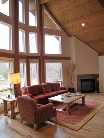 195 Kennedy Road Northampton, MA 01053 - Photo 8 of 22 a living room with furniture windows and a fireplace