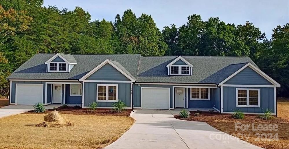 5507 Bucks Garage Road, Unit A Maiden, NC 28650 - Photo 1 of 17 a front view of a house with yard
