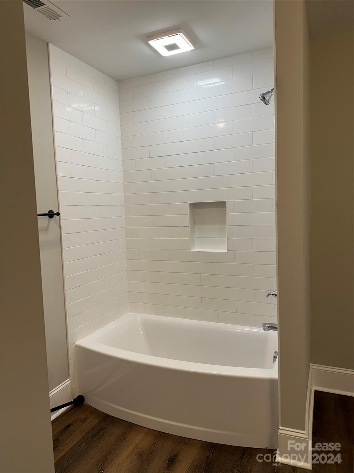 5507 Bucks Garage Road, Unit A Maiden, NC 28650 - Photo 11 of 17 a bathroom with a bathtub and a shower
