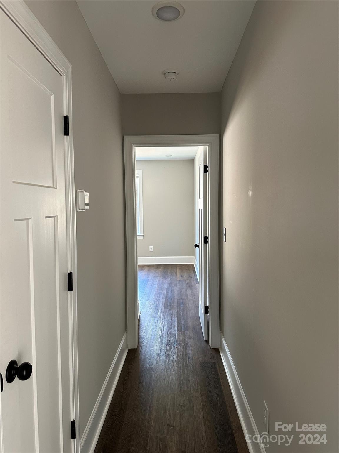 5507 Bucks Garage Road, Unit A Maiden, NC 28650 - Photo 13 of 17 a view of a hallway with wooden floor