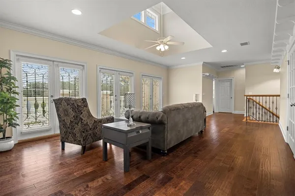 swimming pool view with a seating space