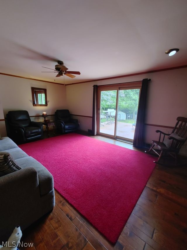 2211 Devonshire Road Northwest Canton, OH 44708 - Photo 14 of 36 Family room featuring dark hardwood / wood-style floors and ceiling fan