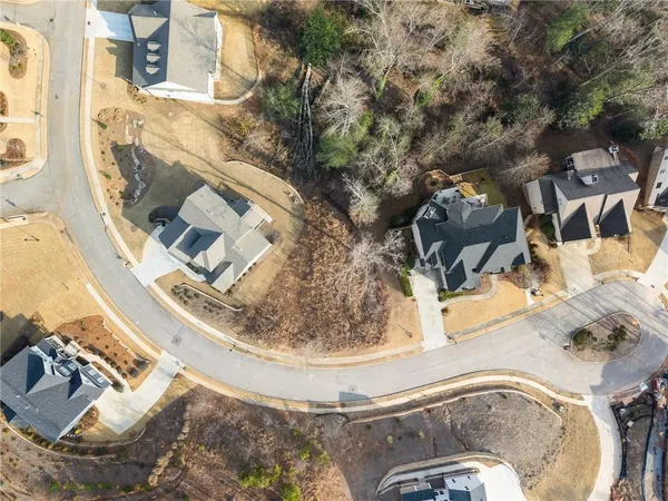 a view of a swimming pool in the backyard
