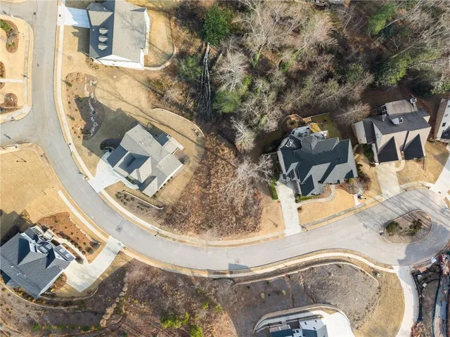 a view of a swimming pool in the backyard