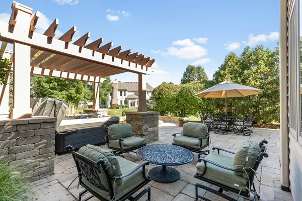 a outdoor living space with furniture and garden view