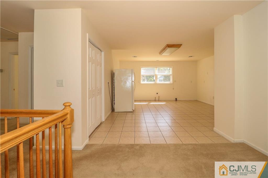 48 Woodbrook Road Edison, NJ 08820 - Photo 17 of 22 a view of an empty room and window