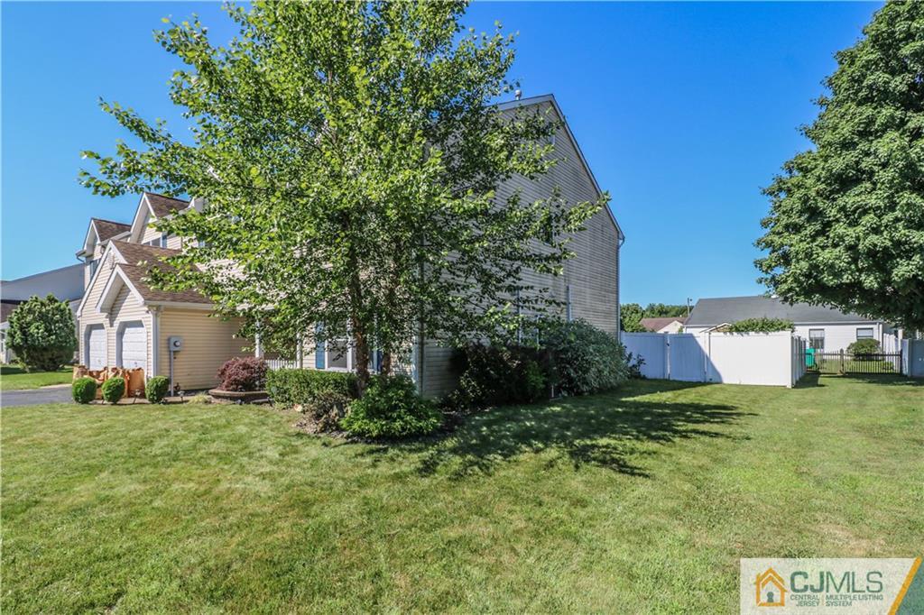48 Woodbrook Road Edison, NJ 08820 - Photo 22 of 22 a view of a house with a yard