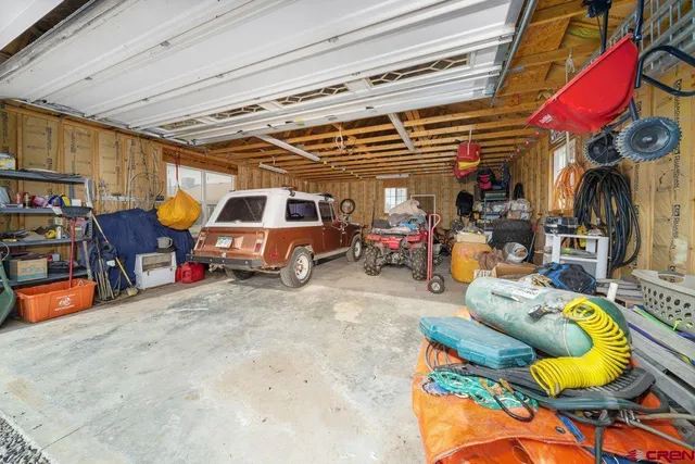 a room with furniture and a chandelier