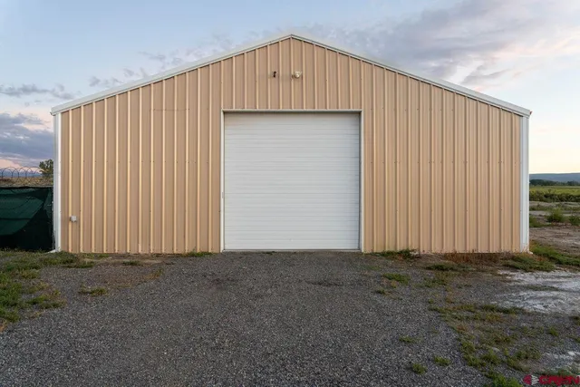 an empty room with wooden door