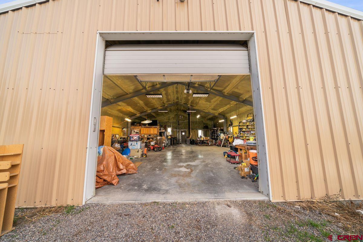 66460 Ogden Road Montrose, CO 81401 - Photo 32 of 40 wooden view of water heater room