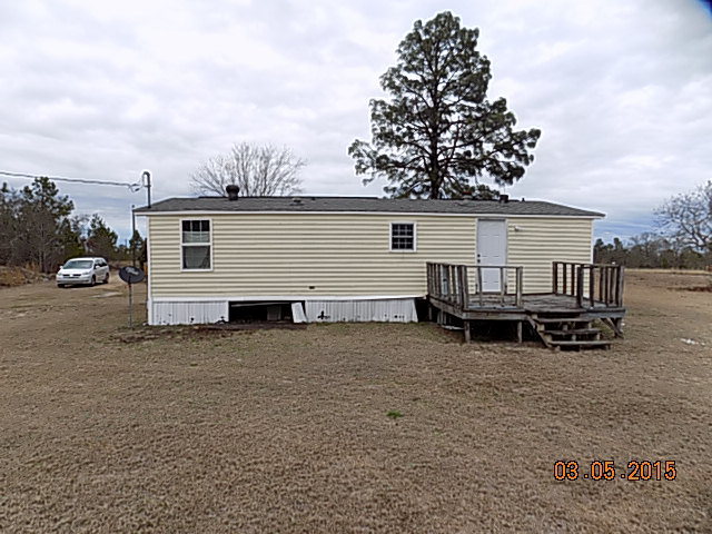1356 Carl Sutton Road Lizella, GA 31052 - Photo 3 of 15 a view of a house with a patio