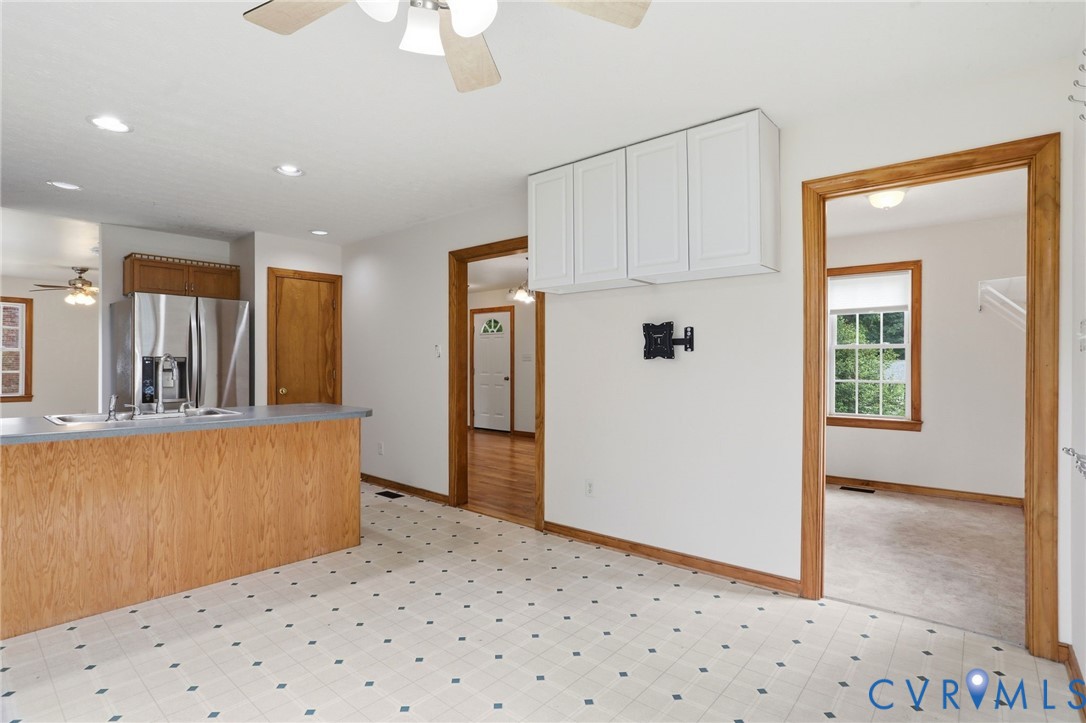 14420 Branding Iron Road Chesterfield, VA 23838 - Photo 14 of 50 Kitchen and living area featuring a breakfast bar