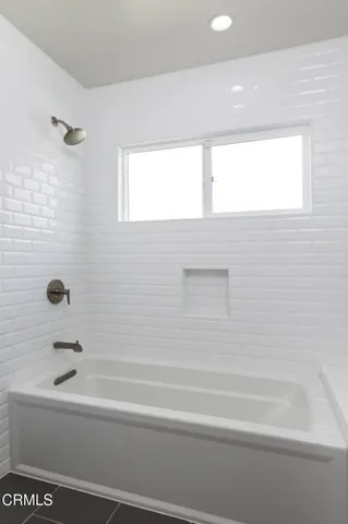 a bathroom with a bathtub
