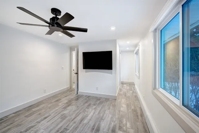a view of a livingroom with a flat screen tv