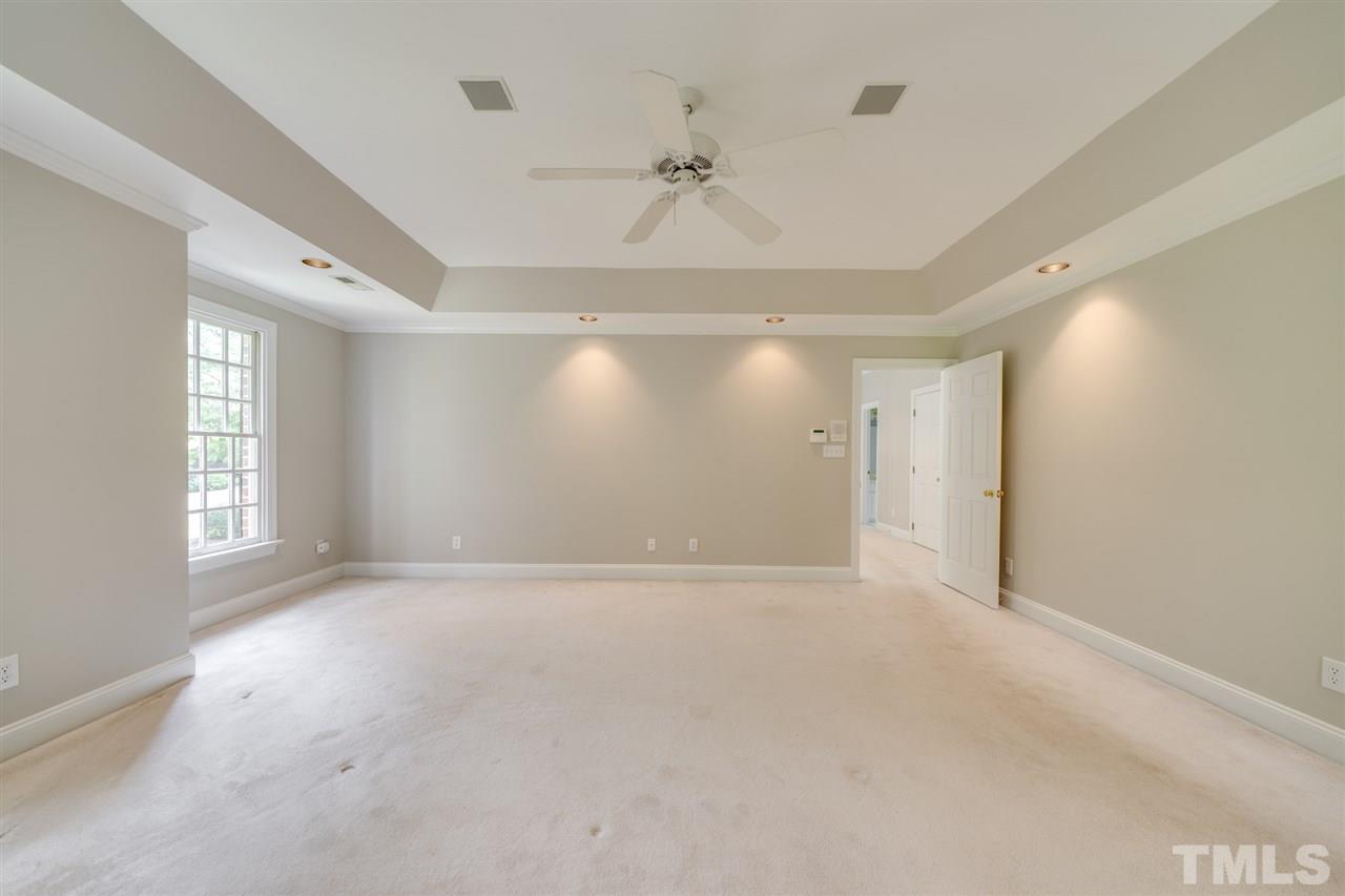 209 Claflin Court Raleigh, NC 27614 - Photo 12 of 30 When you've had a busy day, come home and enjoy some peace and quiet in this huge master bedroom with a beautiful trey ceiling and fresh paint.