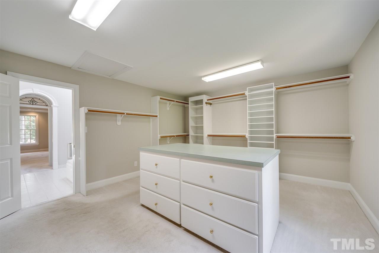 209 Claflin Court Raleigh, NC 27614 - Photo 14 of 30 Are you serious? Look at the size of this custom master closet. You may have to go clothes shopping just to fill it!!!