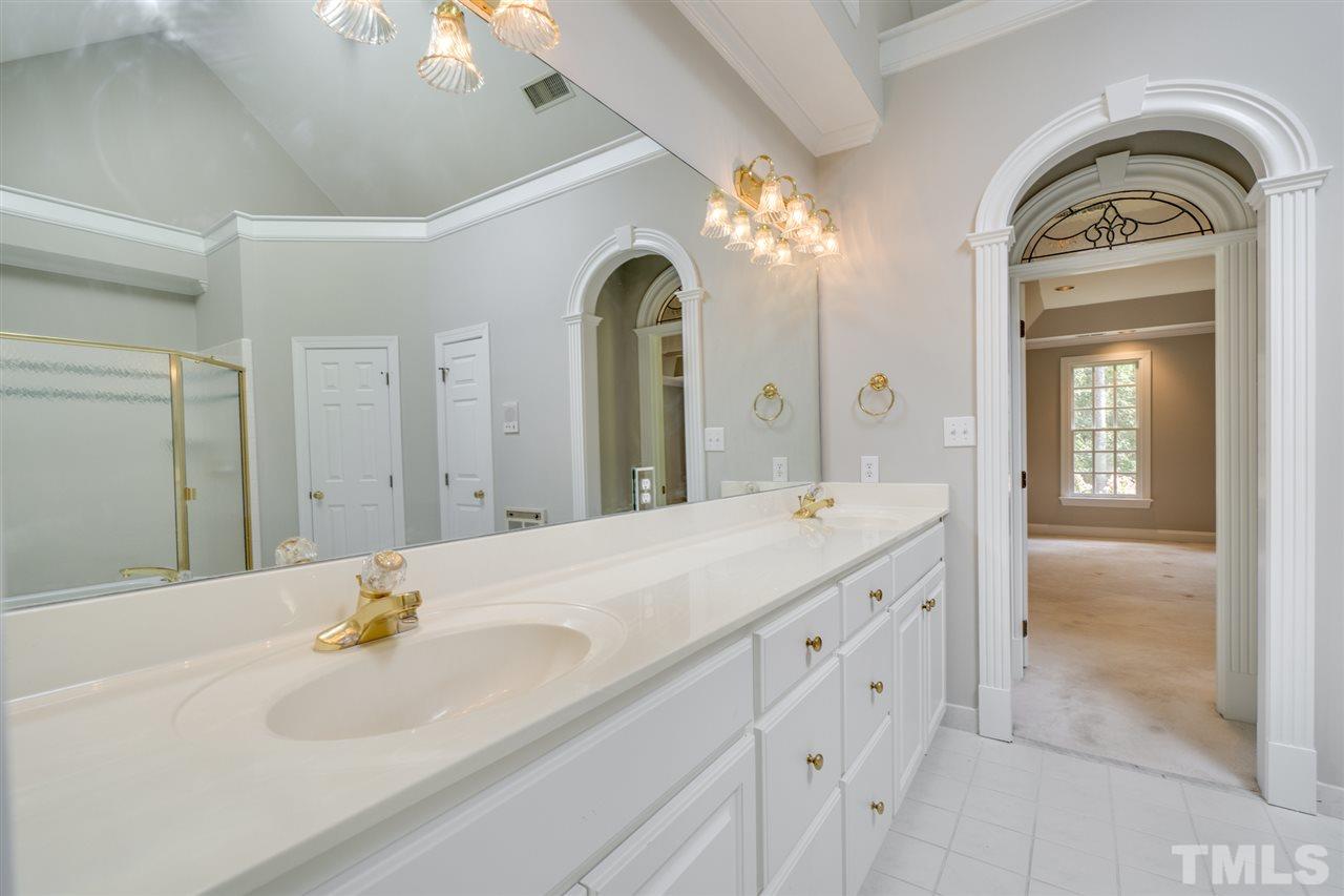 209 Claflin Court Raleigh, NC 27614 - Photo 16 of 30 Dual Vanity and plenty of cabinets, so you can each have your own spot.