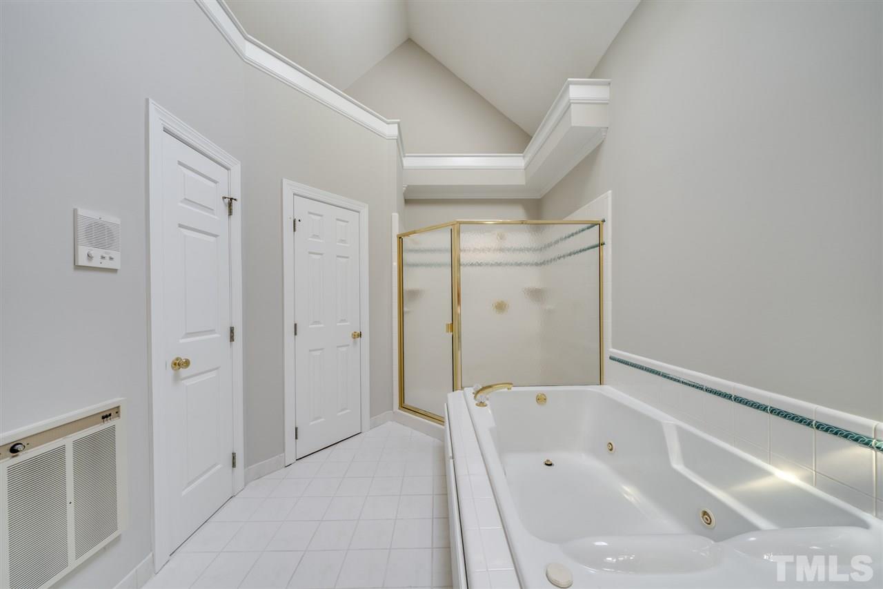 209 Claflin Court Raleigh, NC 27614 - Photo 17 of 30 Enjoy a glass of wine in your large garden tub.