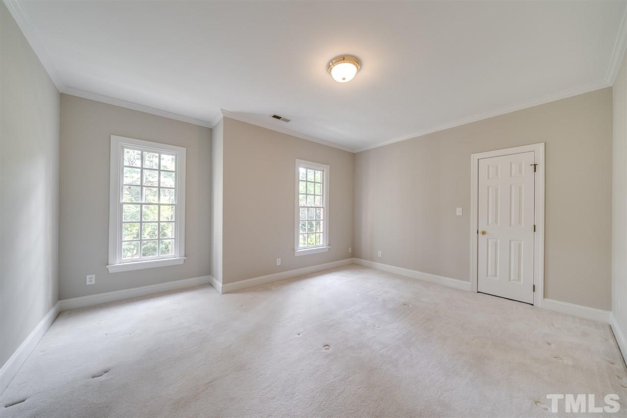 209 Claflin Court Raleigh, NC 27614 - Photo 19 of 30 Large upstairs bedroom with beautiful view of your yard.